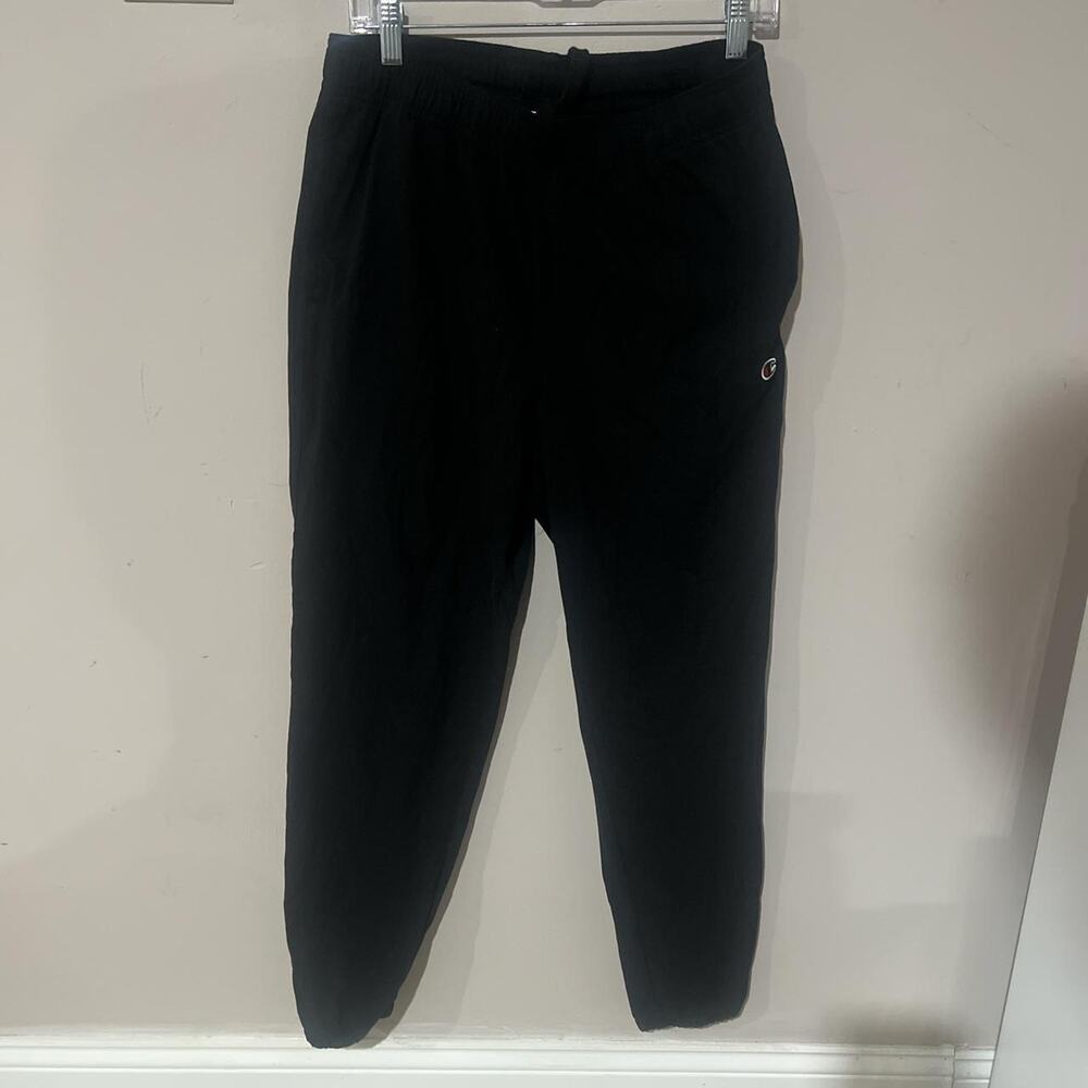 Black champion joggers with white